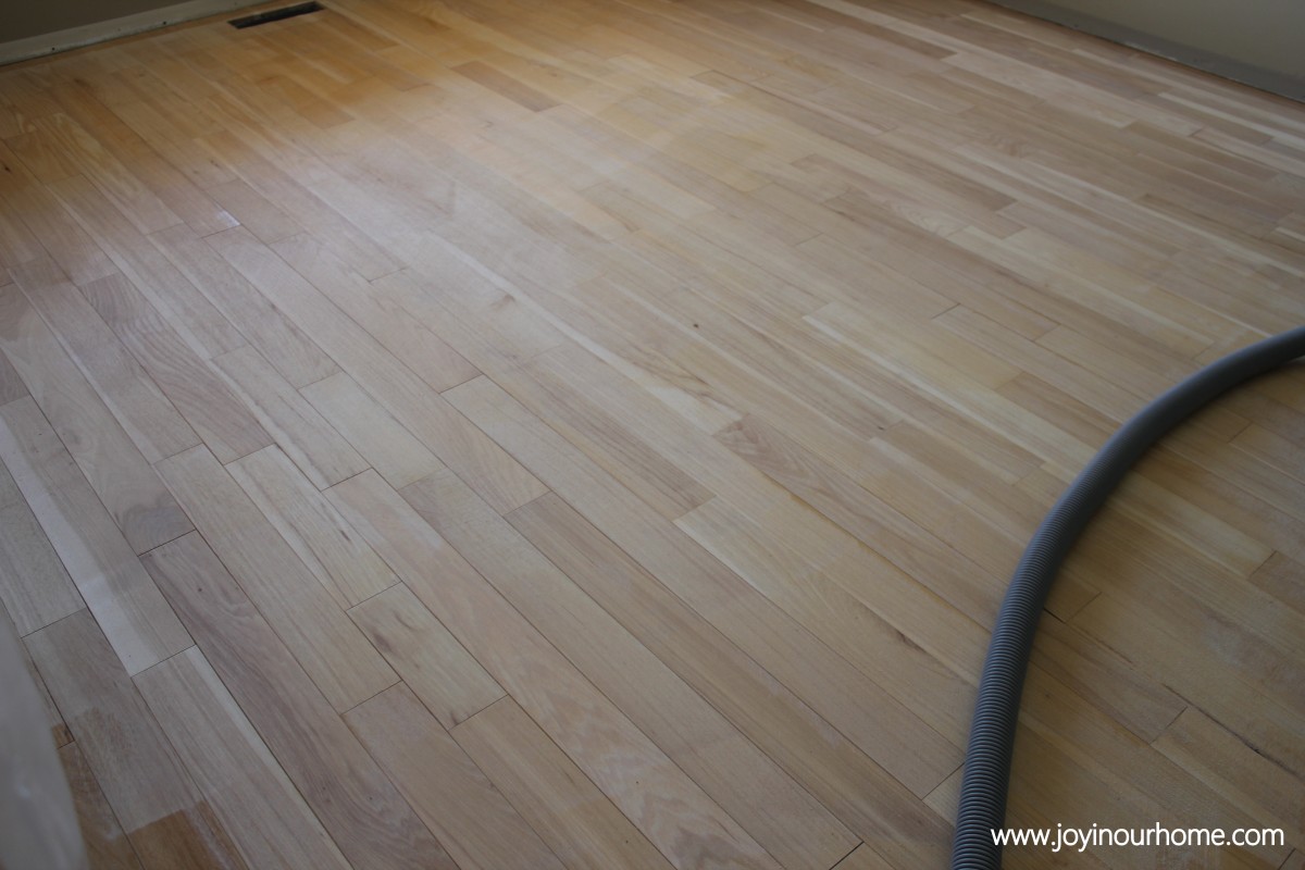 Our Journey in Refinishing Hardwood Floors at www.joyinourhome.com
