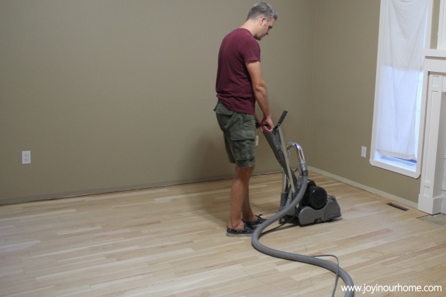 Our Journey in Refinishing Hardwood Floors at www.joyinourhome.com