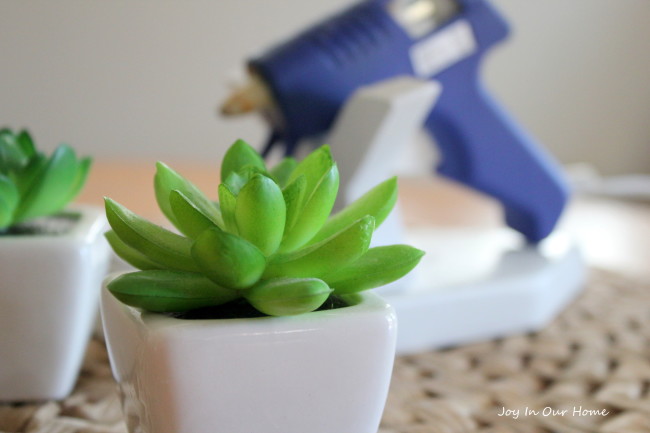 DIY Glue Gun Stand from www.joyinourhome.com