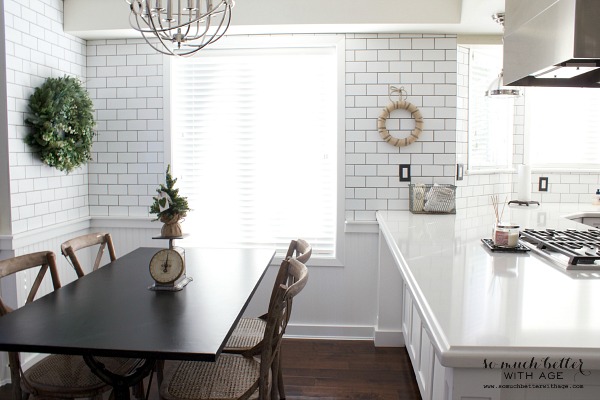 Subway tile in eating area of kitchen | somuchbetterwithage.com